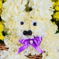 Puppy in a Basket of Flowers Ridgefield