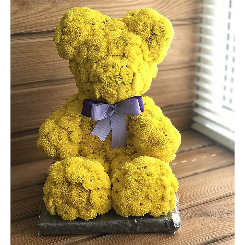 Yellow teddy with a tie-bow Yellow teddy with a tie-bow