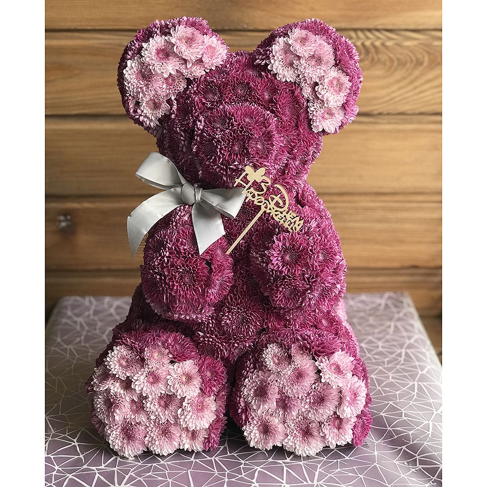 Pink teddy with a tie-bow