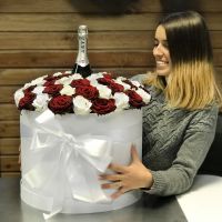 Roses in hat box with a champagne Bashtanka