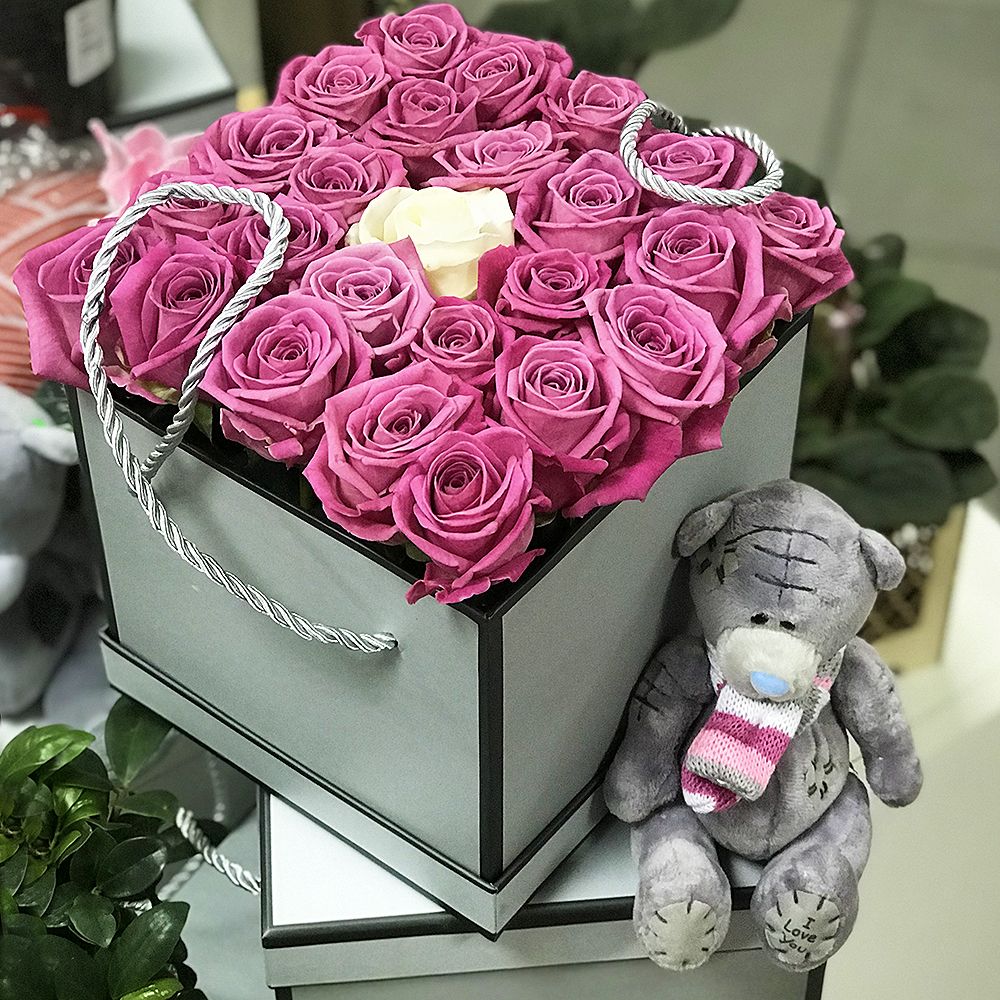 Рожеві троянди в коробці Рожеві троянди в коробці