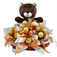 Arrangement of chocolates with teddy bear Side