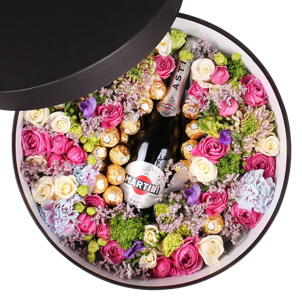 Box with flowers and champagne