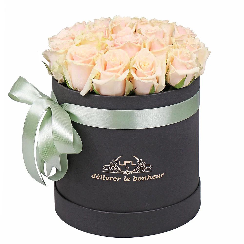 Cream roses in a box