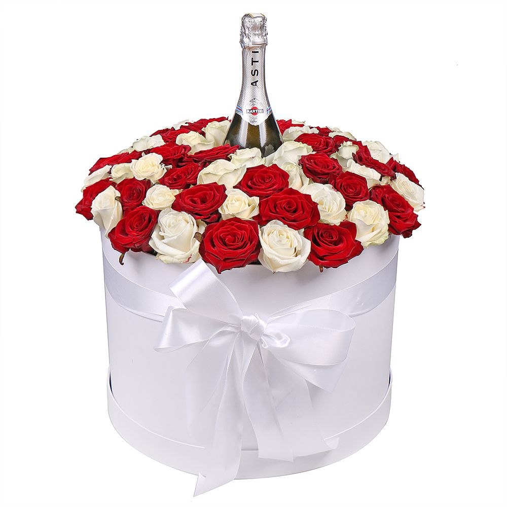 Roses in hat box with a champagne Roses in hat box with a champagne