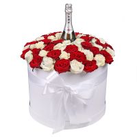 Roses in hat box with a champagne Rovigo